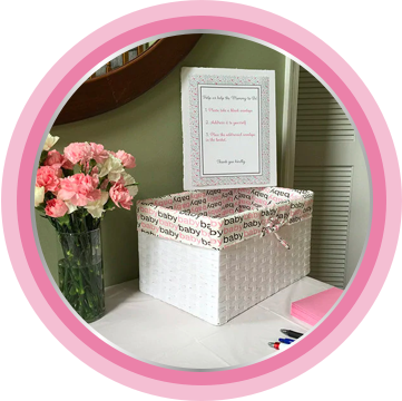 A box of practical essentials, including nappy cream, can be a perfect gift for new parents!
