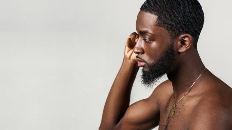 Man applying Bepanthen Derma cream on his face